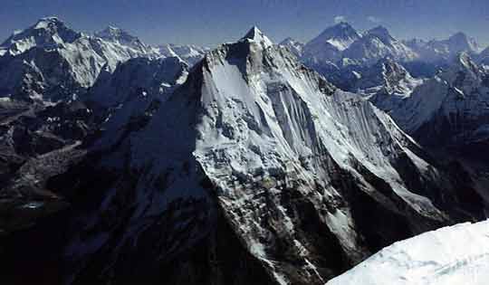 
Menlungtse seen from the south summit of Gauri Shankar on November 9, 1979 after the first ascent. Cho Oyu is on the left; Everest, Lhotse, Nuptse and Makalu are on the right. - Himalaya Alpine Style: The Most Challenging Routes on the Highest Peaks book
